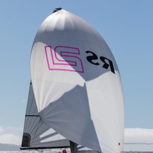 RS21 Sailing Boat with asymmetric spinnaker sailing on a sunny day