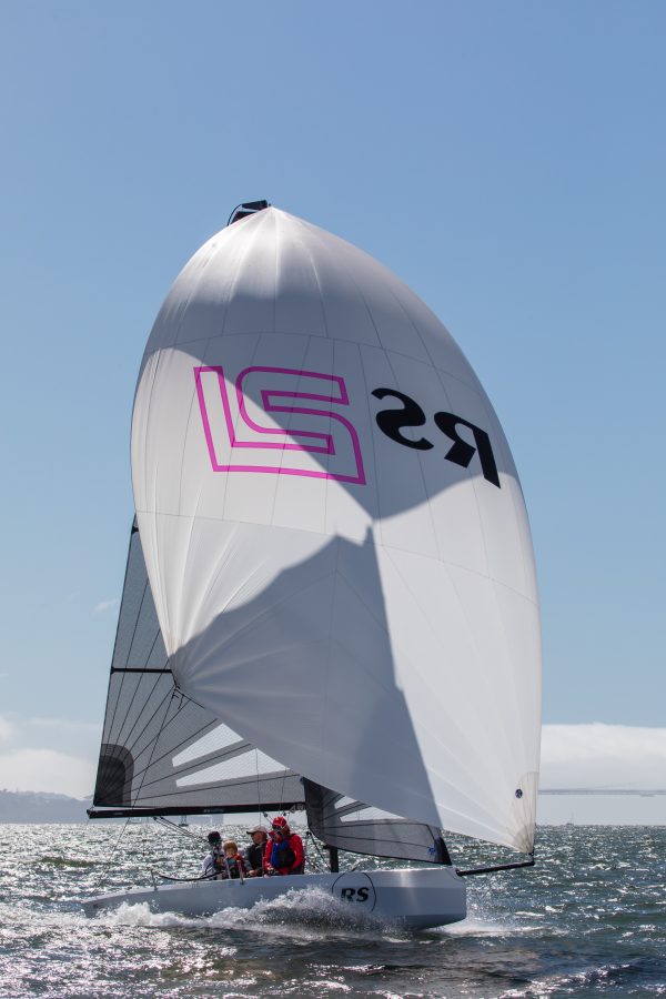 RS21 Sailing Boat with asymmetric spinnaker sailing on a sunny day