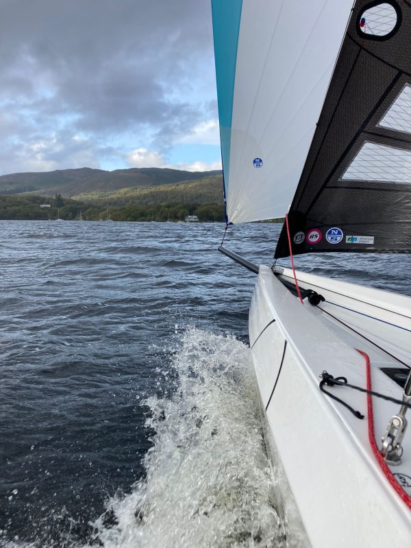 RS21 sailing boat with the kite up, sailing on Loch Lomond